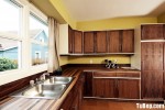 Tủ bếp gỗ Melamin màu vân gỗ hình chữ L TBT0750