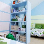 Wide view of blue and green decorated kid's room with blue shelf to store toys and items, striped wall with pastel blue and green colors, beds with new bedding, and storage boxes.