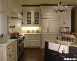 Tủ bếp gỗ Tần Bì sơn men trắng chữ L có bàn đảo và hệ khung tủ lạnh – TBT2241